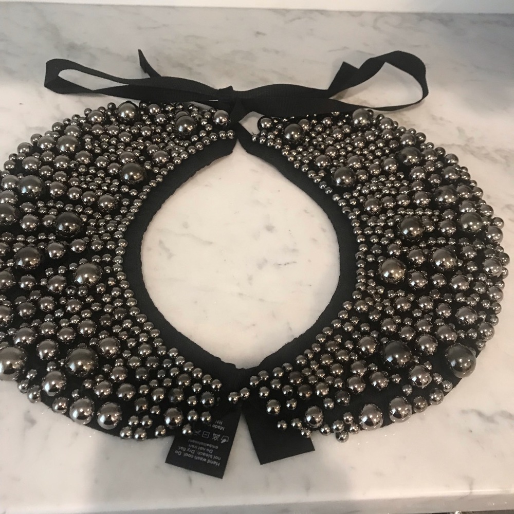 Co statement necklace